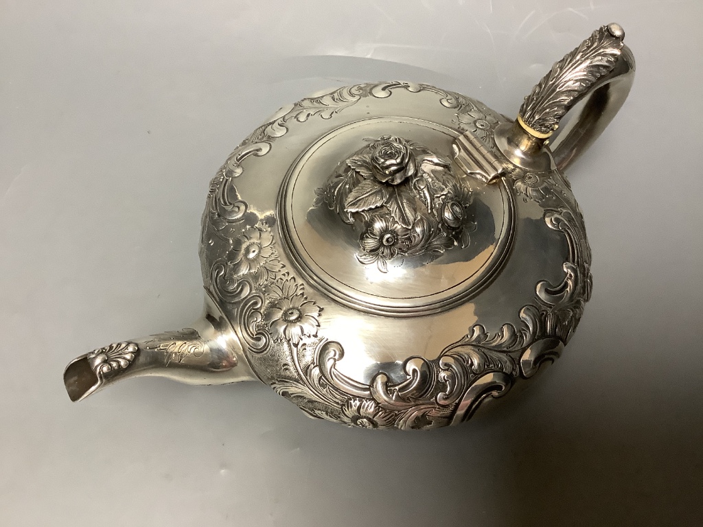 A Victorian embossed silver squat melon shaped teapot, Walter Morrise, London, 1846, height 14.1cm